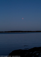 Totally eclipsed Moon over Juan de Fuca Strait