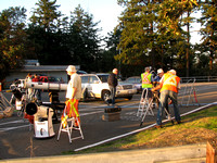 RASC members setting up telescopes in the parking lot