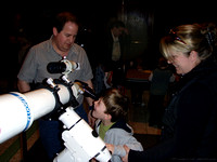 Brian Robilliard and a young astronomer using Victoria Centre's Takahashi