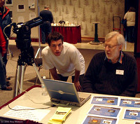 David Griffiths shows a Pearson College student how the Meade LPI webcam works