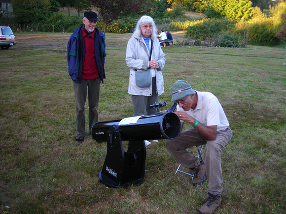 Sid Sidhu aiming the telescope
