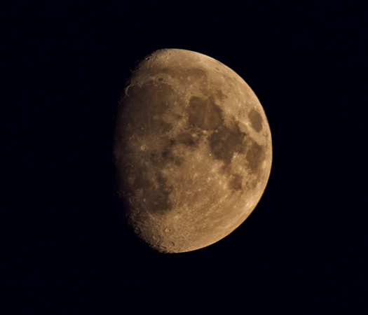 11-day old Waxing Gibbous Moon low in the smoky haze