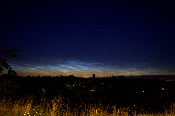 Comet C/2020 F3 (NEOWISE) & noctilucent clouds in the NE sky with an aircraft tracking above the comet