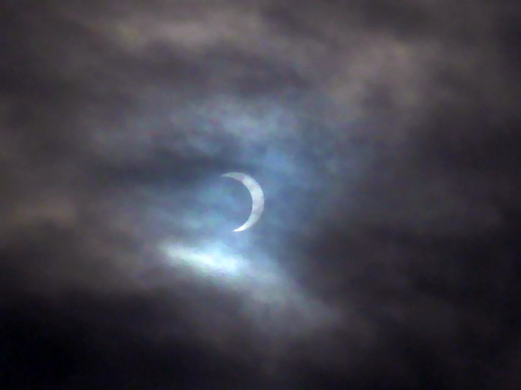 Annular Solar Eclipse - partial eclipse taken through clouds
