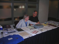 Betty and Joe at the registration desk