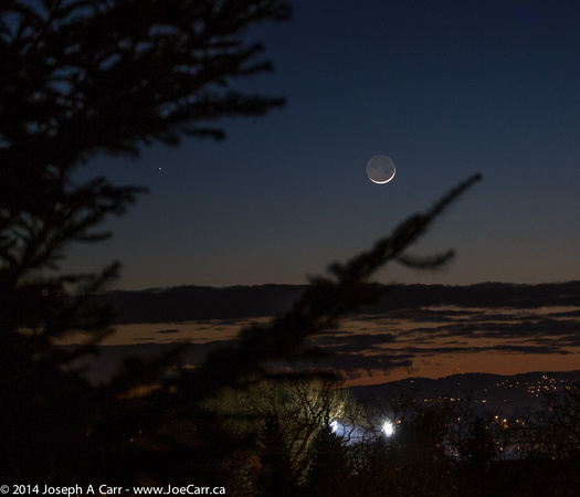 A one day old Moon following the setting Sun with Mercury close