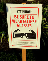 Sign: wear eclipse glasses