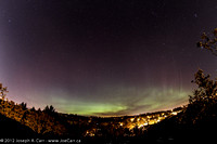 Aurora to the NE - lots of spires and some pink colour above the green