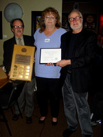 Sherry Buttnor receives Newton Ball Service Award from Bruno Quenneville and Nelson Walker