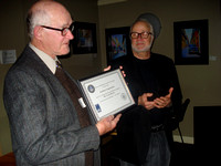 John McDonald receives service certificate on behalf of Lauri Roche from Nelson Walker