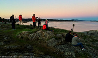 Lunar Eclipse observers on the Cattle Point shoreline looking Ea