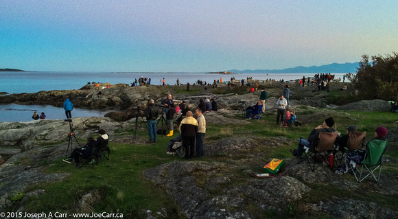 Lunar Eclipse observers on the Cattle Point shoreline looking Ea