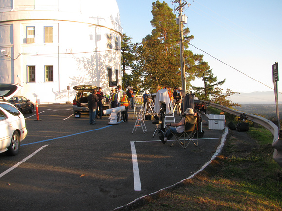 RASC members setting up telescopes in the parking lot