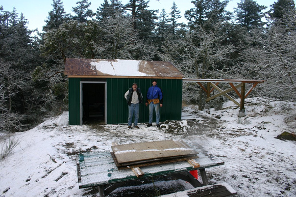 Bruno and Charles (igloo builders) showing the completed roof sheeting