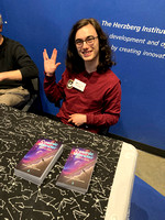 Nathan Hellner-Mestelman signs his book