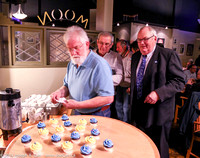 Moe Raven, Paul Schumacher & Chris Gainor eye the cupcakes