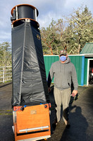 Mike Krempotic beside the Obsession 20" Dobsonian telescope on the observing pad