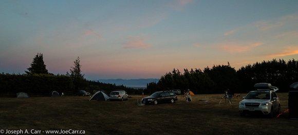 Campers on the observing field at dusk
