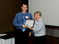 Matt Watson receives a Volunteer Appreciation Certificate for his work with the Victoria Centre Observatory