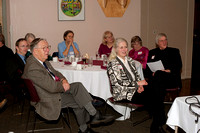 A rapt group listens to the guest speaker