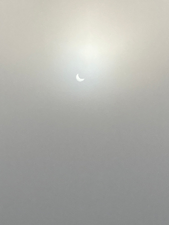 Partial eclipse through fog 47 minutes in