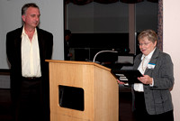 Lauri Roche presents a Volunteer Appreciation Certificate to Mark Bohlman