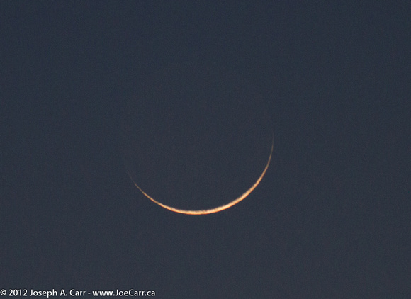 One day old thin Crescent Moon