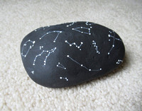 Painted constellations on a rock