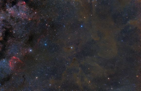 The Iris nebula (NGC 7023) and the dust clouds of Cepheus