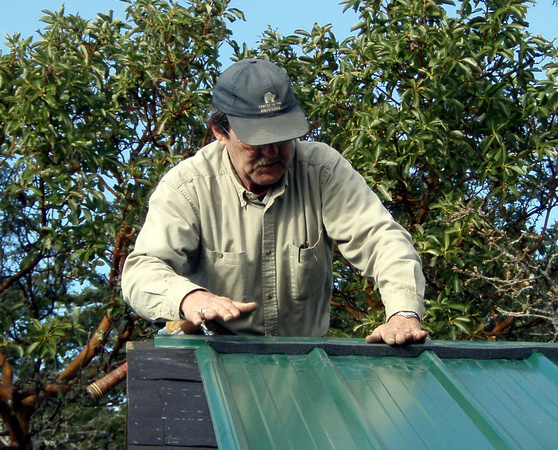 Bruno installing the roof cap
