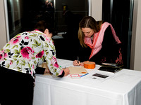 Li-Ann Skibo signs up attendee Mary-Clare Carder
