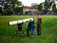 Nelson Walker observes sunspots through Alex Schmid's telescope