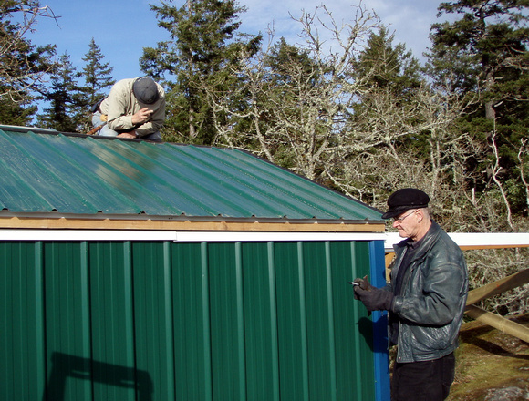 Bruno and John finishing off the roofing installation
