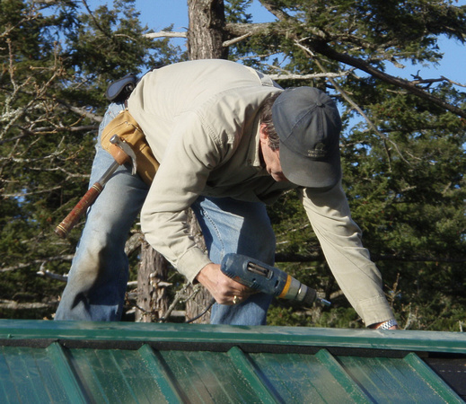 Bruno installing the roof cap
