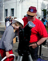 Chris Gainor shares a view with a young astronomer