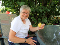 Lauri Roche enjoying an eclipse cookie made by Diane