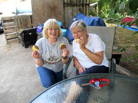Diane and Lauri enjoying an eclipse cookies made by Diane